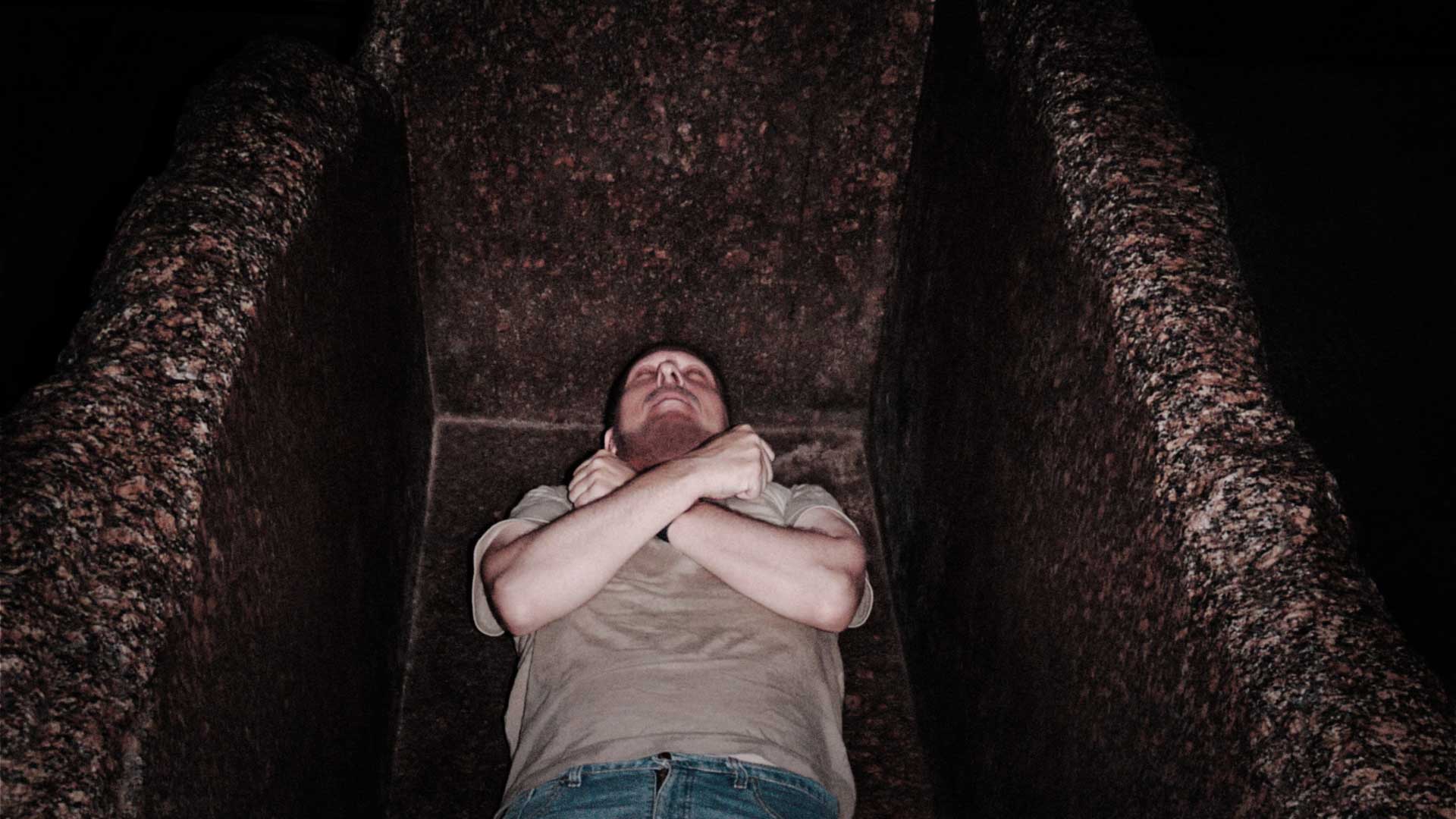Gregor Spörri meditates during his overnight stay in the pyramid of Cheops in the Royal Chamber sarcophagus (1988).